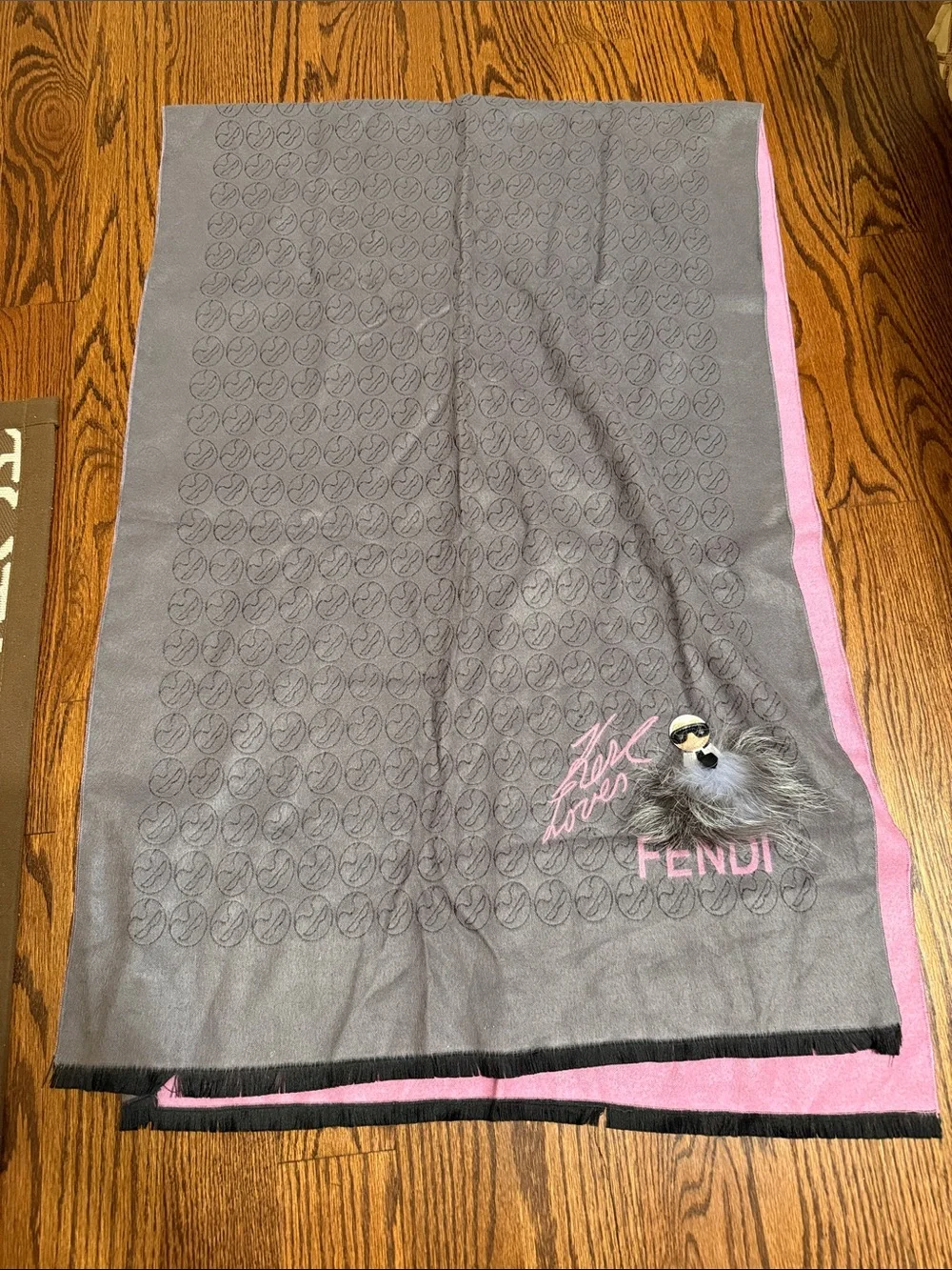 Karl Lagerfeld taupe and pink logo jacquard scarf with fur charm